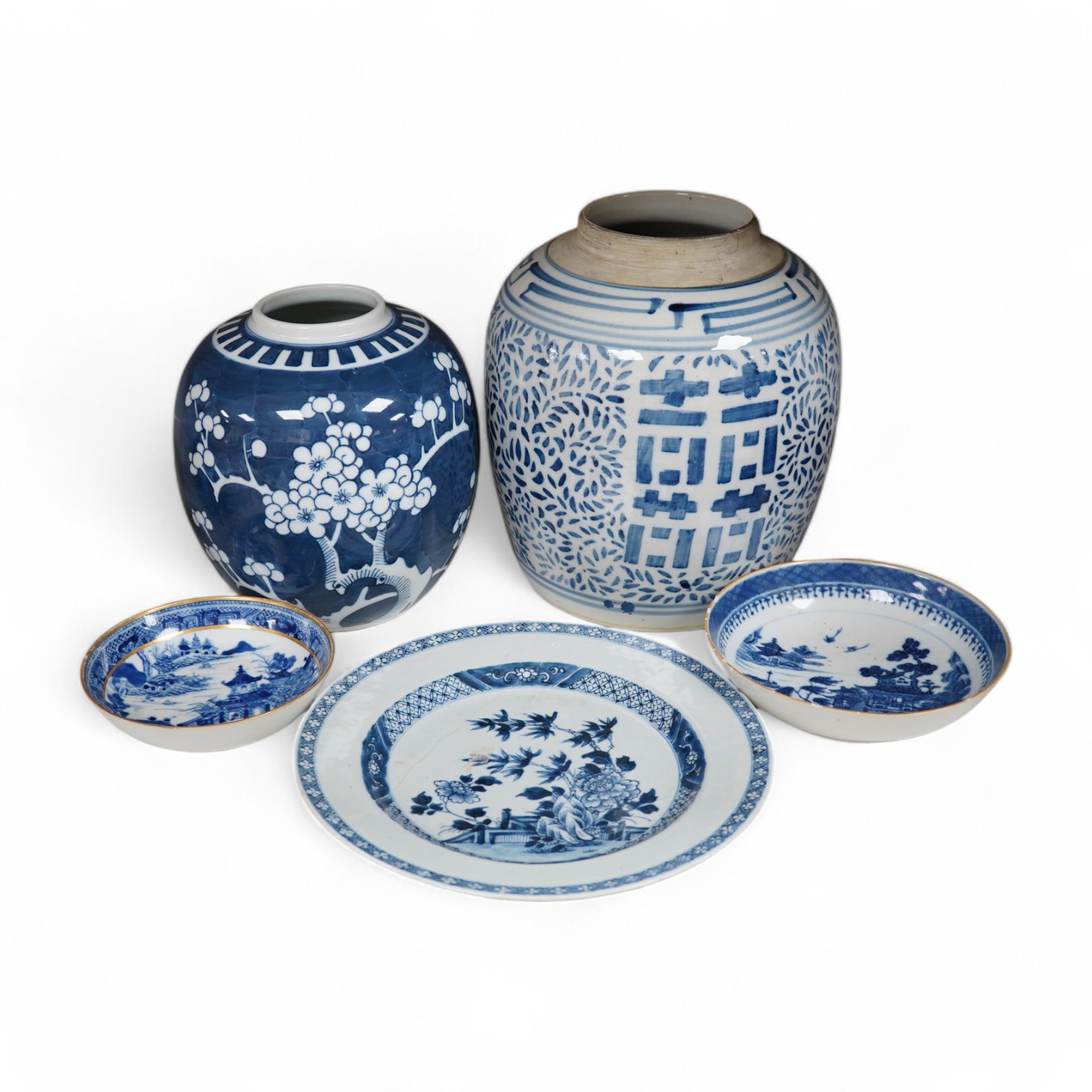 An 18th century Chinese export blue and white plate, together with two other dishes and two ginger jars. Condition - varies